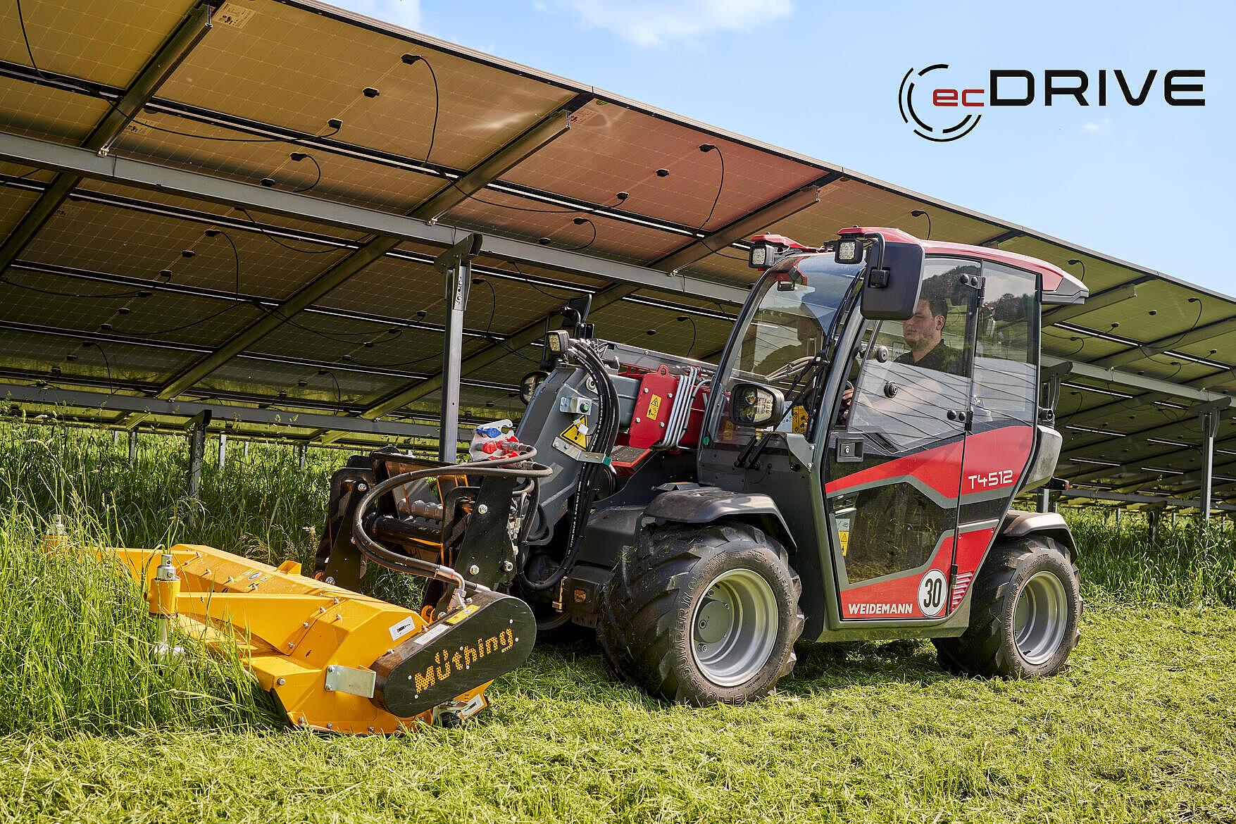 Weidemann chariot télescopique T4512 en action avec tondeuse à fléaux et logo dans la photo de l’ecDrive