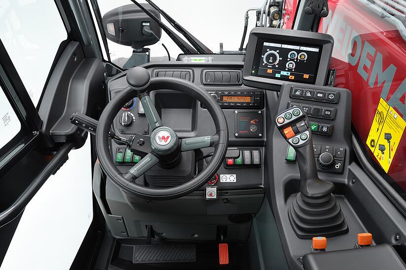 Weidemann telehandler T6025 in studio, color-oriented operating concept